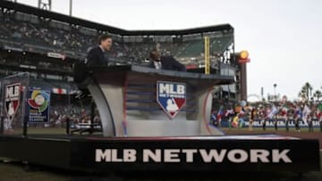 Mar 17, 2013; San Francisco, CA, USA; MLB Network sportscasters Bob Costas (left) and Harold Reynolds (right) before the game between Japan and Puerto Rico during the World Baseball Classic semifinal at AT&T Park. Mandatory Credit: Kelley L Cox-USA TODAY Sports