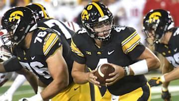 IOWA CITY, IA - SEPTEMBER 22: Iowa Hawkeyes quarterback Nate Stanley (4) gets ready lot hand off the ball during a Big Ten Conference college football game between the Wisconsin Badgers and the Iowa Hawkeyes on September 22, 2018, at Kinnick Stadium, Iowa City, IA. Wisconsin won, 28-17. (Photo by Keith Gillett/Icon Sportswire via Getty Images)