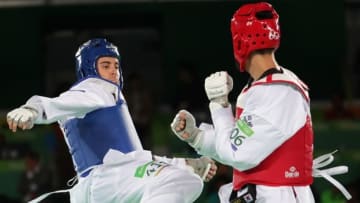 Aug 18, 2016; Rio de Janeiro, Brazil; Joel Gonzalez Bonilla (ESP), red, and Filip Grgic (CRO) compete in a men