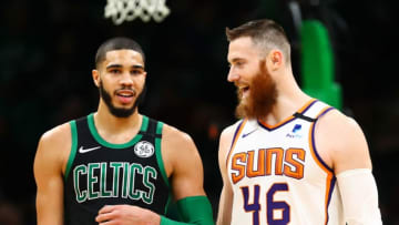 BOSTON, MA - JANUARY 18: Former teammates Aron Baynes #46 of the Phoenix Suns and Jayson Tatum #0 of the Boston Celtics talk during a game at TD Garden on January 18, 2020 in Boston, Massachusetts. NOTE TO USER: User expressly acknowledges and agrees that, by downloading and or using this photograph, User is consenting to the terms and conditions of the Getty Images License Agreement. (Photo by Adam Glanzman/Getty Images)