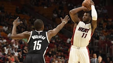 Oct 11, 2016; Miami, FL, USA; Miami Heat guard Dion Waiters (11) shoots over Brooklyn Nets guard Isaiah Whitehead (15) during the second half at American Airlines Arena. Mandatory Credit: Steve Mitchell-USA TODAY Sports