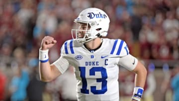 Oct 21, 2023; Tallahassee, Florida, USA; Duke Blue Devils quarterback Riley Leonard (13) celebrates a touchdown during the first quarter against the Florida State Seminoles at Doak S. Campbell Stadium. Mandatory Credit: Melina Myers-USA TODAY Sports