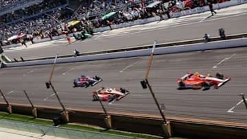 May 24, 2013; Indianapolis, IN, USA; IndyCar Series driver E.J. Viso leads Helio Castroneves and Marco Andretti down the front straight away during carb day for the 2013 Indianapolis 500 at Indianapolis Motor Speedway. Mandatory Credit: Brian Spurlock-USA TODAY Sports