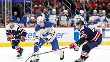 Mar 15, 2023; Washington, District of Columbia, USA; Buffalo Sabres center Tage Thompson (72) and Washington Capitals right wing Tom Wilson (43) battle for the puck in the second period at Capital One Arena. Mandatory Credit: Geoff Burke-USA TODAY Sports