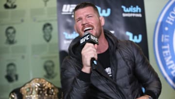 TORONTO, ON - OCTOBER 13 - Middleweight champion Michael Bisping goes nose to nose with Canadian Georges St-Pierre in Friday's UFC 217 teaser at the Hockey Hall of Fame. (Vince Talotta/Toronto Star via Getty Images)