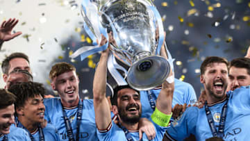 ATATURK OLYMPIC STADIUM, ISTANBUL, TURKEY - 2023/06/11: Ilkay Gundogan (C) of Manchester City FC lifts the trophy as the teammates celebrate during the award ceremony following the UEFA Champions League final football match between Manchester City FC and FC Internazionale. Manchester City FC won 1-0 over FC Internazionale. (Photo by Nicolò Campo/LightRocket via Getty Images)