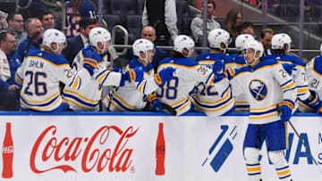 Mar 7, 2023; Elmont, New York, USA; Buffalo Sabres center Dylan Cozens (24) celebrates his goal against the New York Islanders with the Buffalo Sabres bench during the second period at UBS Arena. Mandatory Credit: Dennis Schneidler-USA TODAY Sports