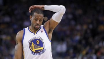 Mar 9, 2014; Oakland, CA, USA; Golden State Warriors forward Andre Iguodala (9) walks onto the court after a timeout against the Phoenix Suns in the second quarter at Oracle Arena. Mandatory Credit: Cary Edmondson-USA TODAY Sports