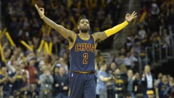 Apr 5, 2015; Cleveland, OH, USA; Cleveland Cavaliers guard Kyrie Irving (2) celebrates in the fourth quarter against the Chicago Bulls at Quicken Loans Arena. Mandatory Credit: David Richard-USA TODAY Sports