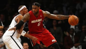 May 12, 2014; Brooklyn, NY, USA; Brooklyn Nets forward Paul Pierce (34) defends against Miami Heat forward LeBron James (6) in the second half in game four of the second round of the 2014 NBA Playoffs at the Barclays Center. Mandatory Credit: Noah K. Murray-USA TODAY Sports