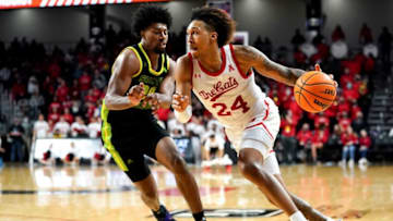 Cincinnati Bearcats guard Jeremiah Davenport drives to the basket against South Florida Bulls at Fifth Third Arena. The Enquirer.