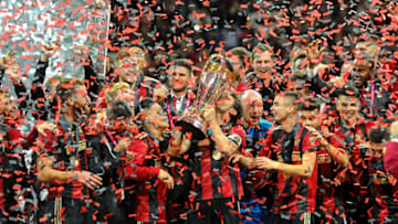 ATLANTA, GA - DECEMBER 08: Atlanta United captain Michael Parkhurst (3) kisses the Major League Soccer Philip F. Anschutz trophy after the MLS Cup Finals match between Atlanta United and Portland Timbers on December 8, 2018 at Mercedes-Benz Stadium in Atlanta, GA.(Photo by John Adams/Icon Sportswire via Getty Images)