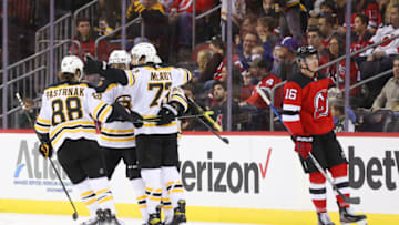 Nov 13, 2021; Newark, New Jersey, USA; The Boston Bruins celebrate a goal by Boston Bruins center Brad Marchand (63) against the New Jersey Devils during the second period at Prudential Center. Mandatory Credit: Ed Mulholland-USA TODAY Sports