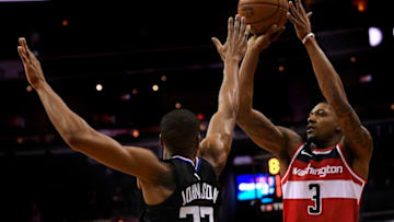 WASHINGTON, DC - DECEMBER 15:Washington Wizards guard Bradley Beal (3) shoots over Los Angeles Clippers forward Wesley Johnson (33) during the first half of the game between the Washington Wizards and the LA Clippers at Capital One Arena on Friday, December 15, 2017. (Photo by Toni L. Sandys/The Washington Post via Getty Images)