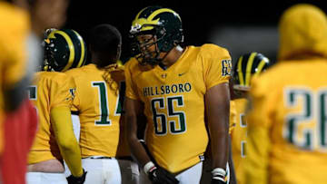 Hillsboro's Jacob Hood (65) works with teammates on the sideline against Cane Ridge during the first half at Hillwood High School in Nashville, Tenn., Friday, Oct. 16, 2020.Hhs Crhs Fb 0101620 An 021