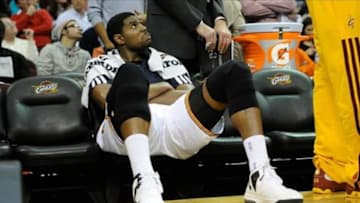 Dec 10, 2013; Cleveland, OH, USA; Cleveland Cavaliers center Andrew Bynum sits on the bench during a game against the New York Knicks at Quicken Loans Arena. Cleveland won 109-94. Mandatory Credit: David Richard-USA TODAY Sports