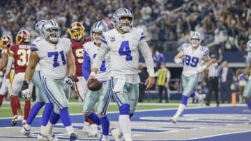 ARLINGTON, TX - NOVEMBER 22: Dallas Cowboys quarterback Dak Prescott (4) celebrates after a scoring a touchdown during the game between the Dallas Cowboys and the Washington Redskins on November 22, 2018 at AT&T Stadium in Arlington, Texas. (Photo by Matthew Pearce/Icon Sportswire via Getty Images)