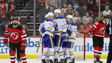 Apr 21, 2022; Newark, New Jersey, USA; The Buffalo Sabres celebrate a goal by defenseman Rasmus Dahlin (26) against the New Jersey Devils during the second period at Prudential Center. Mandatory Credit: Ed Mulholland-USA TODAY Sports