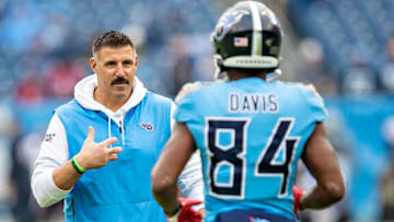 NASHVILLE, TN - DECEMBER 15: Head Coach Mike Vrabel talks with Corey Davis #84 of the Tennessee Titans on the field before a game against the Houston Texans at Nissan Stadium on December 15, 2019 in Nashville, Tennessee. The Texans defeated the Titans 24-21. (Photo by Wesley Hitt/Getty Images)