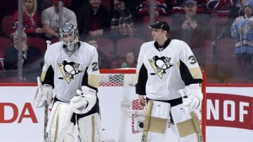 Jan 9, 2016; Montreal, Quebec, CAN; Pittsburgh Penguins goalie Marc-Andre Fleury (29) and teammate Jeff Zatkoff (37) skate off the ice after defeating the Montreal Canadiens 3-1 at the Bell Centre. Mandatory Credit: Eric Bolte-USA TODAY Sports