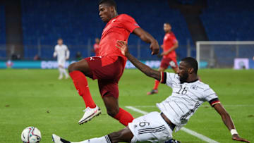 BASEL, SWITZERLAND - SEPTEMBER 06: Breel Embolo of Switzerland is challenged by Antonio Ruediger of Germany during the UEFA Nations League group stage match between Switzerland and Germany at St. Jakob-Park on September 06, 2020 in Basel, Switzerland. (Photo by Matthias Hangst/Getty Images)