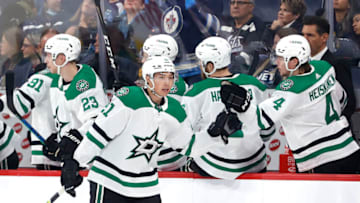 Nov 8, 2022; Winnipeg, Manitoba, CAN; Dallas Stars left wing Jason Robertson (21) celebrates his second period goal against the Winnipeg Jets at Canada Life Centre. Mandatory Credit: James Carey Lauder-USA TODAY Sports