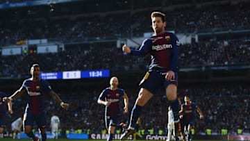 MADRID, SPAIN - DECEMBER 23: Lionel Messi of Barcelona celebrates after scoring his sides second goal during the La Liga match between Real Madrid and Barcelona at Estadio Santiago Bernabeu on December 23, 2017 in Madrid, Spain. (Photo by Denis Doyle/Getty Images)
