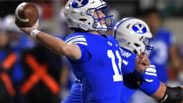 SALT LAKE CITY, UT - NOVEMBER 24: Quarterback Zach Wilson #11 of the Brigham Young Cougars throws the ball against the Utah Utes in a game at Rice-Eccles Stadium on November 24, 2018 in Salt Lake City, Utah. (Photo by Gene Sweeney Jr/Getty Images)