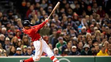 BOSTON, MA - MAY 18: Mookie Betts #50 of the Boston Red Sox hits an RBI double during the sixth inning of a game against the Baltimore Orioles on May 18, 2018 at Fenway Park in Boston, Massachusetts. (Photo by Billie Weiss/Boston Red Sox/Getty Images)