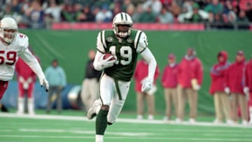 7 Nov 1999: Keyshawn Johnson #19 of the New York Jets carries the ball during a game against the Arizona Cardinals at Giants Stadium in East Rutherford, New Jersey. The Jets defeated the Cardinals 12-7.