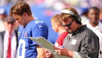 Sep 14, 2014; East Rutherford, NJ, USA; New York Giants quarterback Eli Manning (10) and offensive coordinator Ben McAdoo on the sidelines during the fourth quarter against the Arizona Cardinals at MetLife Stadium. The Cardinals defeated the Giants 25-14. Mandatory Credit: Brad Penner-USA TODAY Sports