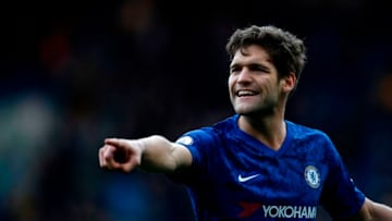 Chelsea's Spanish defender Marcos Alonso gestures during the English Premier League football match between Chelsea and Everton at Stamford Bridge in London on March 8, 2020. (Photo by Adrian DENNIS / AFP) / RESTRICTED TO EDITORIAL USE. No use with unauthorized audio, video, data, fixture lists, club/league logos or 'live' services. Online in-match use limited to 120 images. An additional 40 images may be used in extra time. No video emulation. Social media in-match use limited to 120 images. An additional 40 images may be used in extra time. No use in betting publications, games or single club/league/player publications. / (Photo by ADRIAN DENNIS/AFP via Getty Images)