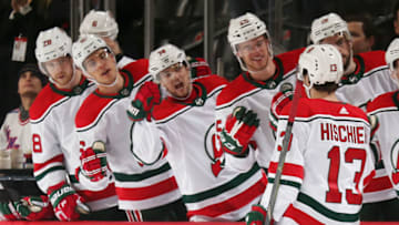 NEWARK, NJ - JANUARY 31: Nico Hischier #13 of the New Jersey Devils is congratulated as he returns to the bench after scoring a goal during the first period against the New York Rangers at the Prudential Center on January 31, 2019 in Newark, New Jersey. (Photo by Andy Marlin/NHLI via Getty Images)