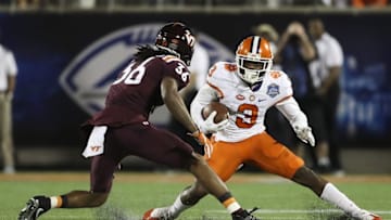 Dec 3, 2016; Orlando, FL, USA; Clemson Tigers wide receiver Artavis Scott (3) runs the ball in the first quarter as Virginia Tech Hokies cornerback Adonis Alexander (36) defends during the ACC Championship college football game at Camping World Stadium. Mandatory Credit: Logan Bowles-USA TODAY Sports