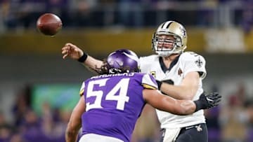 MINNEAPOLIS, MN - JANUARY 14: Drew Brees #9 of the New Orleans Saints throws a pass under pressure from Eric Kendricks #54 of the Minnesota Vikings during the second half of the NFC Divisional Playoff game at U.S. Bank Stadium on January 14, 2018 in Minneapolis, Minnesota. (Photo by Jamie Squire/Getty Images)