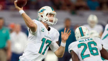 Sep 28, 2014; London, UNITED KINGDOM; Miami Dolphins quarterback Ryan Tannehill (17) prepares to pass during the first half of the game between the Miami Dolphins and the Oakland Raiders at Wembley Stadium. Mandatory Credit: Steve Flynn-USA TODAY Sports