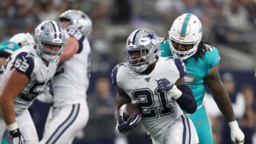 ARLINGTON, TEXAS - SEPTEMBER 22: Ezekiel Elliott #21 of the Dallas Cowboys runs the ball against the Miami Dolphins at AT&T Stadium on September 22, 2019 in Arlington, Texas. (Photo by Ronald Martinez/Getty Images)