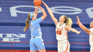 Jan 19, 2021; Syracuse, New York, USA; North Carolina Tar Heels guard Alyssa Ustby (1) shoots over Syracuse Orange forward Digna Strautmane (45) in the first quarter at Carrier Dome. Mandatory Credit: Mark Konezny-USA TODAY Sports