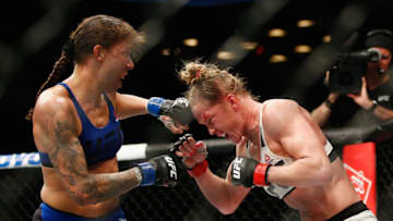 NEW YORK, NY - FEBRUARY 11: (L-R) Germaine de Randamie of The Netherlands throws a punch against Holly Holm of United States in their UFC women's featherweight championship bout during UFC 208 at the Barclays Center on February 11, 2017 in the Brooklyn Borough of New York City. (Photo by Anthony Geathers/Getty Images)