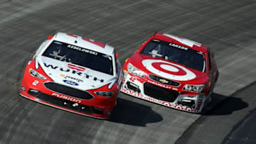 May 15, 2016; Dover, DE, USA; NASCAR Sprint Cup Series driver Brad Keselowski (2) leads driver Kyle Larson (42) during the AAA 400 Drive For Autism at Dover International Speedway. Mandatory Credit: Matthew O