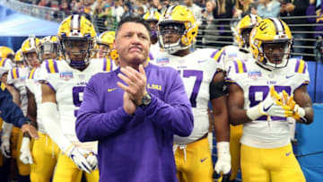 GLENDALE, ARIZONA - JANUARY 01: Head coach Ed Orgeron of the LSU Tigers waits to take the field before the PlayStation Fiesta Bowl between LSU and Central Florida at State Farm Stadium on January 01, 2019 in Glendale, Arizona. (Photo by Christian Petersen/Getty Images)