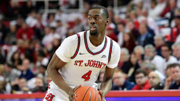 NEW YORK, NEW YORK - MARCH 01: Greg Williams Jr. #4 of the St. John's basketball team controls the ball against the Creighton Bluejays at Carnesecca Arena on March 01, 2020 in New York City. (Photo by Steven Ryan/Getty Images)