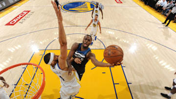 OAKLAND, CA - NOVEMBER 8: Andrew Wiggins #22 of the Minnesota Timberwolves goes to the basket against the Golden State Warriors on November 8, 2017 at ORACLE Arena in Oakland, California. NOTE TO USER: User expressly acknowledges and agrees that, by downloading and/or using this Photograph, user is consenting to the terms and conditions of the Getty Images License Agreement. Mandatory Copyright Notice: Copyright 2017 NBAE (Photo by Andrew D. Bernstein/NBAE via Getty Images)