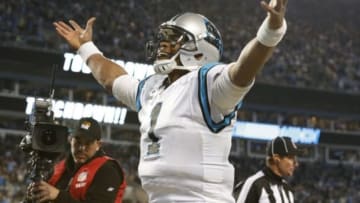 Jan 24, 2016; Charlotte, NC, USA; Carolina Panthers quarterback Cam Newton (1) celebrates during the fourth quarter against the Arizona Cardinals in the NFC Championship football game at Bank of America Stadium. Mandatory Credit: Jason Getz-USA TODAY Sports