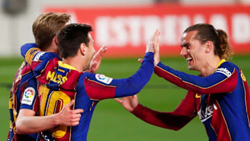 Lionel Messi of FC Barcelona celebrates with Antoine Griezmann and Frenkie De Jong of FC Barcelona at Camp Nou. (Photo by Eric Alonso/Getty Images)