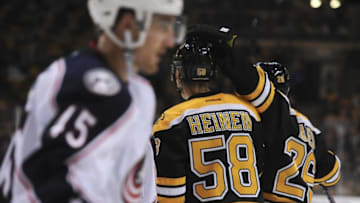 Sep 26, 2016; Boston, MA, USA; Boston Bruins winger Danton Heinen is congratulated by defenseman John-Michael Liles (26) after scoring a goal in the third period during a preseason hockey game against the Columbus Blue Jackets at TD Garden. Mandatory Credit: Bob DeChiara-USA TODAY Sports