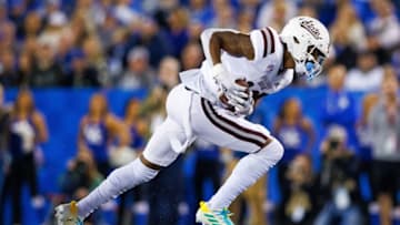 Oct 15, 2022; Lexington, Kentucky, USA; Mississippi State Bulldogs wide receiver Justin Robinson (18) runs the ball during the first quarter against the Kentucky Wildcats at Kroger Field. Mandatory Credit: Jordan Prather-USA TODAY Sports
