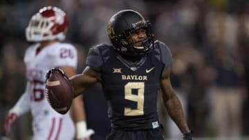 Nov 14, 2015; Waco, TX, USA; Baylor Bears wide receiver KD Cannon (9) attempts to fire up the crowd during the second half against the Oklahoma Sooners at McLane Stadium. Mandatory Credit: Jerome Miron-USA TODAY Sports