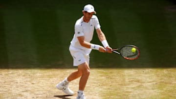 LONDON, ENGLAND - JULY 12: Andy Murray of Great Britain plays a backhand during the Gentlemen's Singles quarter final match against Sam Querrey of The United States on day nine of the Wimbledon Lawn Tennis Championships at the All England Lawn Tennis and Croquet Club on July 12, 2017 in London, England. (Photo by Clive Brunskill/Getty Images)