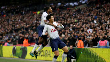LONDON, ENGLAND - DECEMBER 26: Heung-Min Son of Tottenham Hotspur celebrates with Kyle Walkers-Peters of Tottenham Hotspur after he scores his sides second goal during the Premier League match between Tottenham Hotspur and AFC Bournemouth at Tottenham Hotspur Stadium on December 26, 2018 in London, United Kingdom. (Photo by Henry Browne/Getty Images)